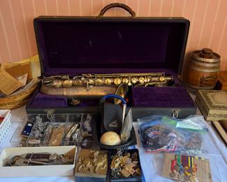 vintage silver-plated saxophone by 
C.G. Conn C Melody  dated 1914