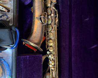 vintage silver-plated saxophone by 
C.G. Conn C Melody  dated 1914