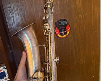 vintage silver-plated saxophone by 
C.G. Conn C Melody  dated 1914