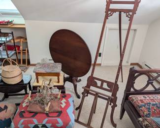 Painting Easel, Tilt Top Table, Upholstered Ottomans, Needlework Stools, Woven Baskets