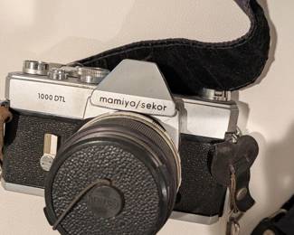 Camera with strap and carry bag