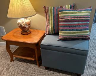 Many end tables, ottoman with storage , many accent pillows 
