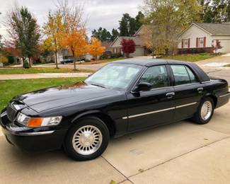 1999 Grand Marquis LS 104,000 miles ( aprox) 
Excellent , well maintained car. Runs great 