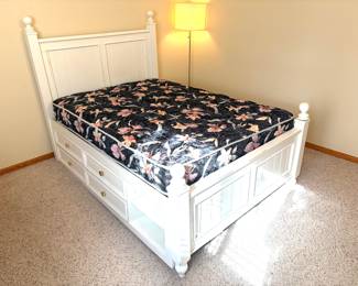 Super cute full size young American bed with like new mattress and built in bottom dresser storage. 