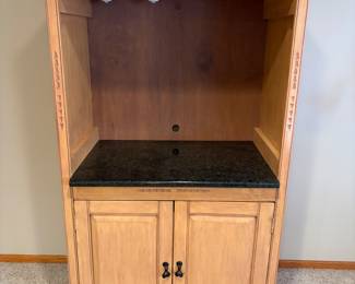 AVAILABLE FOR EARLY PURCHASE! 
Beautiful, stone top media armoire entertainment center tv stand desk with bottom cabinet storage and built in rolling/pullout waste bin. Comes from a very clean, smoke free home. $125
Willing to help load or delivery is available. 
Call or text 507-458-2542 for more pictures or information. 