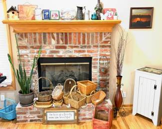 Collection of baskets including Longaberger baskets and home decor. 