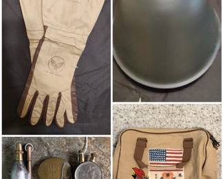 A pair of vintage U.S. Air Force Type K-1 tropical flying gloves from post-WWII, a set of vintage trench lighters and canister-style lighters. A East German M56/76 helmet and a vintage-style WWII pilot bag.