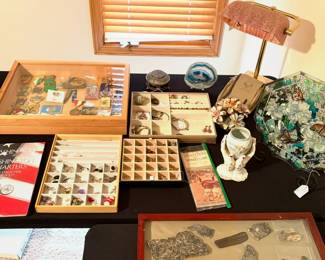 Collection of rocks and military coins.