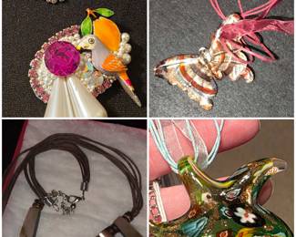 A beautiful collection of costume jewelry brooches and necklaces.