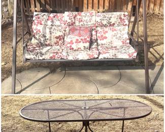 Outdoor porch swing and wrought iron outdoor table. 