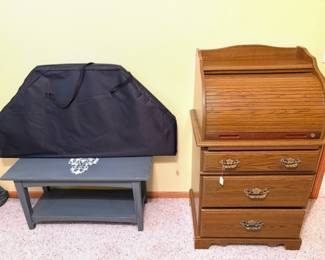Coffee table and a rolled top dresser desk. 