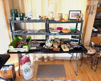 Collection of kitchen utensils and food storage containers. 