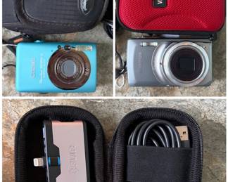 Collection of cameras including a Canon PowerShot SD1200 IS digital camera and an Olympus Stylus 7010 digital camera. Also a FLIR ONE thermal imaging camera designed to attach to a smartphone. 