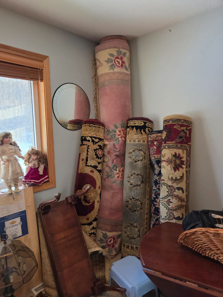 decorative area rugs, possibly traditional Persian or Oriental style carpets. 
They feature intricate floral and geometric patterns typical of handmade or high-quality machine-made rugs. 
Materials typically include wool, silk, or cotton. 
Such rugs vary significantly in value based on age, knot density, and craftsmanship. 