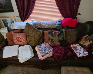 decorative accent pillows and various throw blankets 