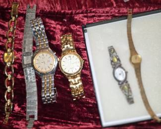 vintage Seiko Kinetic watches, likely from the mid-1990s, including model 5M43-0A70. These unique timepieces are powered by the motion of the wearer's wrist, which generates electrical energy stored in an internal capacitor. 