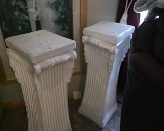 neoclassical style plaster column pedestals, often used as plant stands or sculpture bases. 