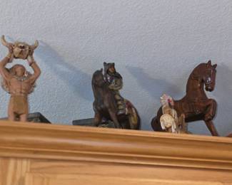 decorative Native American-themed collectible figurines.