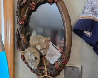 This item is a collectible "Reflections of Nature" fully sculpted wolf mirror by The Bradford Exchange, featuring artwork by artist Al Agnew. 