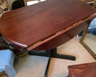 36-inch Dual Drop Leaf Table with a pedestal base and espresso finish