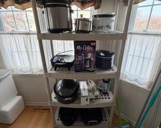 Many storage shelving units