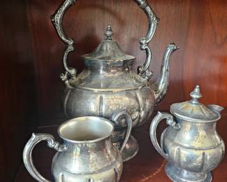 Tea pot with sugar and creamer, plated