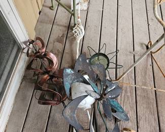 lots of decorative outdoor stakes