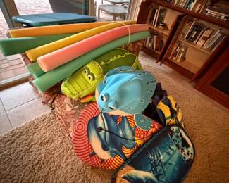 The outdoor furniture cushions are under this pile of pool/beach toys