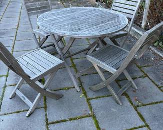 $460. Smith and Hawkins outdoor teak dining set. Table is 42 inches in diameter by 29.25 inches high includes four chairs.