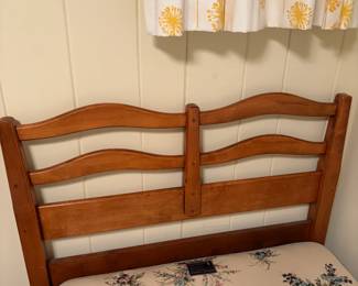 Close-up of the headboard. The headboard on the twin beds are each 37.5 inches high. The foot boards are each 24 inches high. The length of the bed frame is 80 inches.