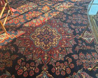 Closer view of the antique Persian rug in previous photo.