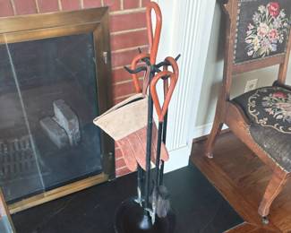 $360. . Jacques Adnet vintage wrought iron fireplace tools with iron frame and saddle leather wrapped handles.  as found.  brush bristles not like new.  