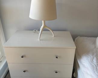 One of two white three drawer chest available for in person shopping Friday and Saturday.  Lamp is one of a pair and each are inches high.  Available during in-person shopping also.