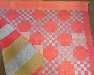 Antique Quilt 
Double Irish Chain  pattern with unique striped back.
73" x 64"