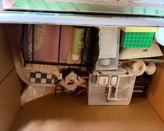 Doll Furniture included with doll house.