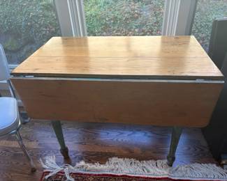 $180. Drop leaf Pine Table as seen is 42 inches wide by 23 inches deep by 30 inches high.  When fully opened on both sides, it is 49 inches deep.