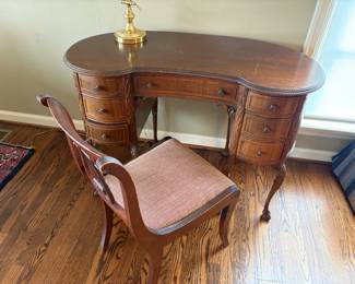 $190. Kidney shaped table - can be used as a desk, a vanity or stand alone without the chair which is sold separately.  