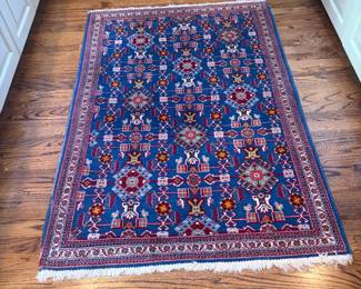 $190. Oriental rug.  3’5 inches  x 5’ long  as found.  Some slight wear on the edges.