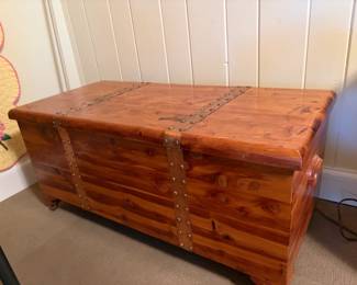 $220 Cedar blanket or hope chest. Copper strapping on the exterior. 41 inches wide by 19.5 inches deep by 19 inches high.