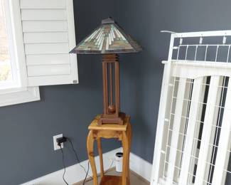 Antique table and Mission style stained glass lamp