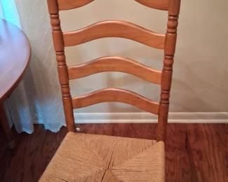 One of the Sprague Carlton ladder back rush seat chairs