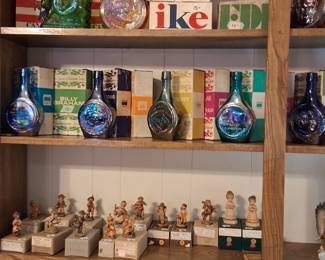 Decanter collection and Anri Italian wood carvings