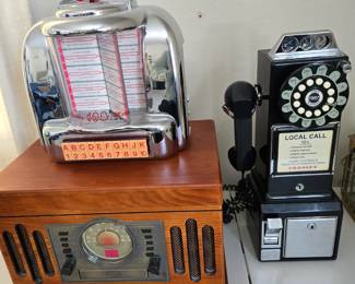 Crosley retro remake phone, jukebox radio, and record player/tape player/CD player/radio
