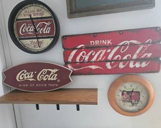Coca-Cola signs and clocks