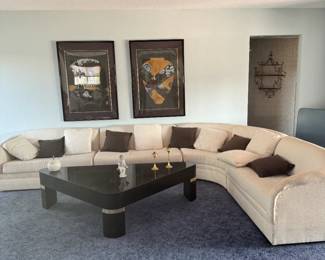Sectional, coffee table, and artwork 
