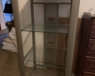 Glass and metal case. Wide shelves great for displays