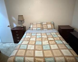 Queen bed on standard metal bed frame.