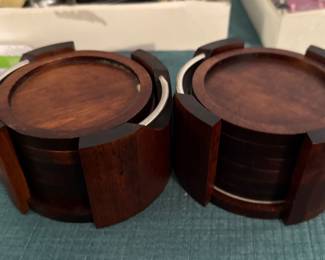 Teak wood coasters in matching wood and chrome holder.