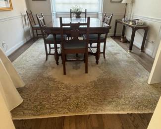 Dining Room Table and chairs are NOT FOR SALE. Rug is for Sale, I believe it is hand tied. 