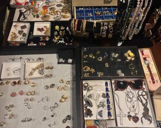 Vintage jewelry, brooches, clip on earrings, tons of necklaces mostly costume, some sterling, a few pieces of fine jewelry. There are lots of signed costume jewelry pieces. 